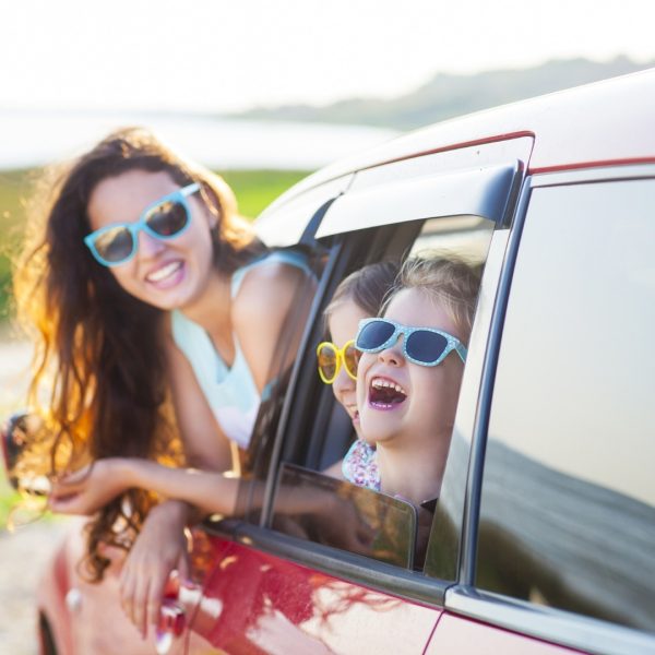 family on vacation in car